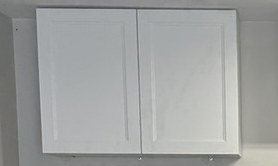 White two-door garage wall cabinet