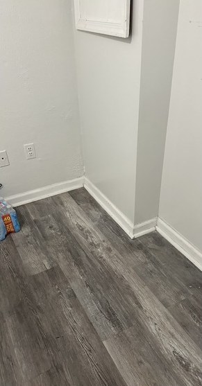 Empty kitchen nook beside a wall before the pantry install