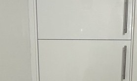 IKEA SEKTION high-gloss white doors with bar pulls