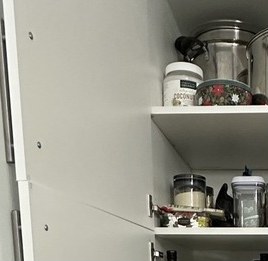 Pantry shelves with pots and jars